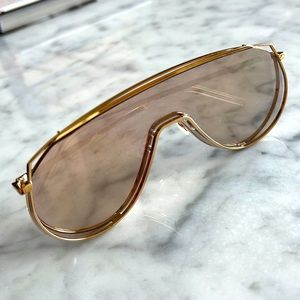 Gentle Monster gold mirrored sunglasses